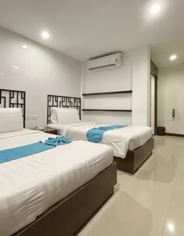 ห้องดีลักซ์เตียงแฝด (ไม่มีหน้าต่าง)