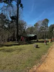 Quiet cabin in the woods w/ access to pools, river, & lakes in gated community!!