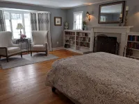 Enjoy comfortable elegance in this secluded grand home located in town