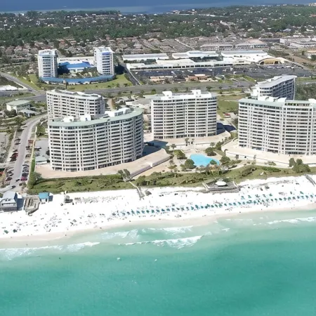 Beachfront resort property with spa, restaurants, pools, courts, and gyms.