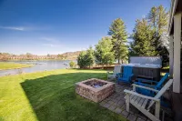 Lake Front Home w/ Hot Tub, Fire pit, yard, walk to Wisp Resort,Tubing Hill View