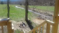 Quaint, secluded cabin with the feel of home. Sleeps 4 with home-like amenities.