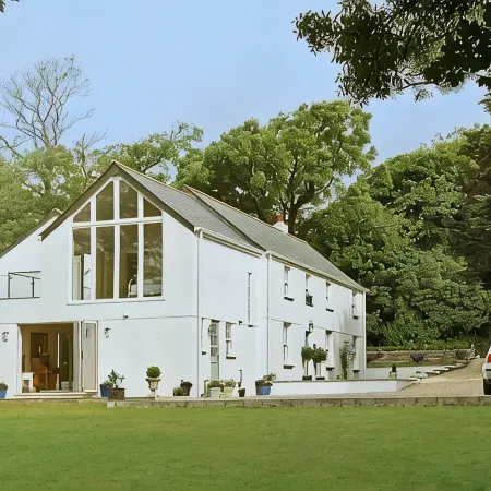 Caroe Farm House