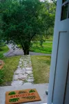 Remodeled home in the woods, just past city limits. With horse pasture nearby!