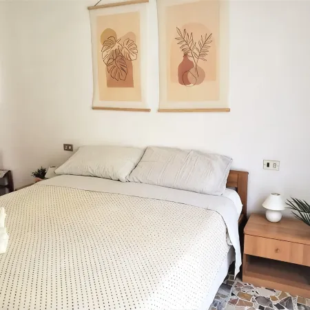 Charming Perledo Retreat with Lake View, Balcony & Parking