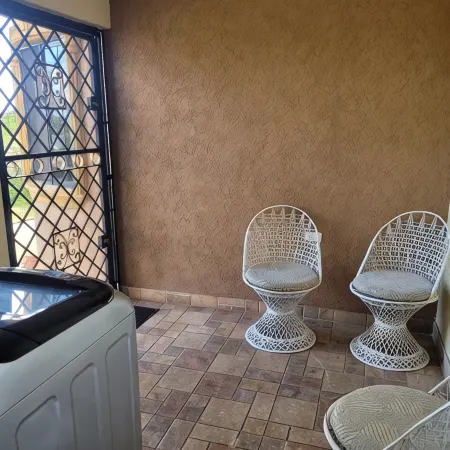 Spacious 2-bedroom apartment in Mandeville with hot tub ,WiFi and private garage