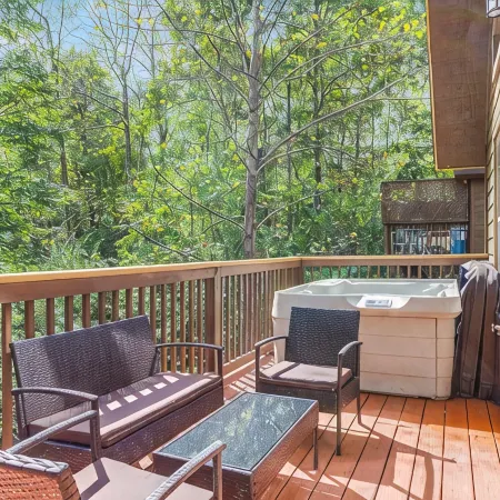 Only Minutes to Attractions with Indoor Sauna, Hot Tub, Games, and Fireplace!