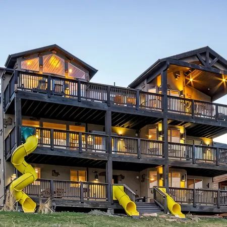 The "Big House" with.. Indoor Basketball, Trampoline and Play set, Theater Room