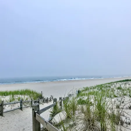 1st Fl of duplex. Sunsets over the bay, walk to beach. Great family getaway.