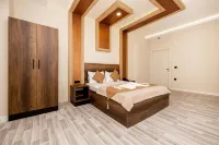 Perla Blanca Hotel Отели в г. 