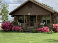 Historic Early Settler Farm House that Has Been Modernized For Your Comfort.