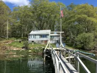 2 bedroom  1 bath, large deck and dock, on the water in peaceful cove,   Year - Wifi