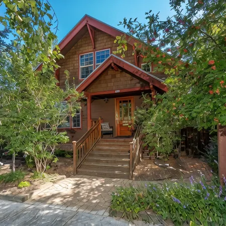 WALK EVERYWHERE!  4 BEDROOMS +BONUS RM & QUAINT BACKYARD