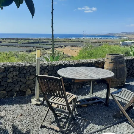 Volcanic lava stone house short walk to the beach, sea and mountain views
