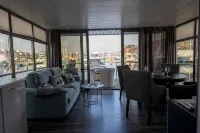 Houseboat Luv in Sonwik harbor with a view of Denmark