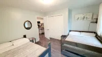 Spacious 4-bedroom waterfront house in Sylvan Beach with private yard and dock.