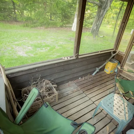 Spiral Staircase Leads To The Lofted Bedroom And Overlooks The Birch Woods.