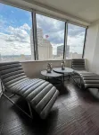 Cozy Retreat with Rooftop Pool, Parking, and Spacious Comfort - Condos
