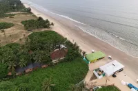 Nasya's Beach Side Cottages - Beach