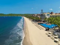 Condo at front of the beach inside a Resort compound hotel.
