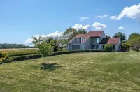 Coan River Cottage w/ Fire Pit, Pool, Movie Room