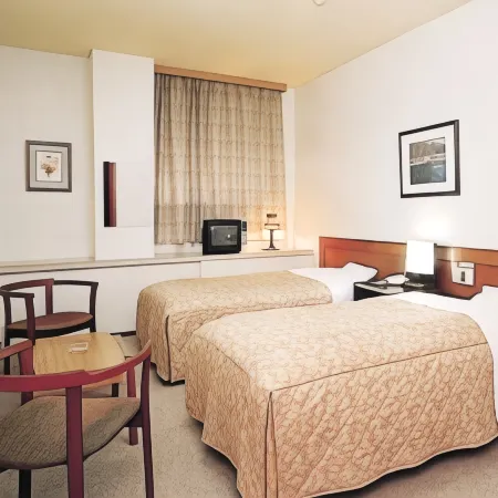 Koriyama Central Hotel Отели в г. Корияма