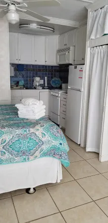 Popular   ~ Quaint. Bogue Shores Condo --  just steps to a beautiful beach