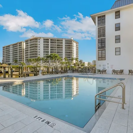 Vanderbilt Beach Condo, Bay Views, New Saltwater Pool, Walk to Beach