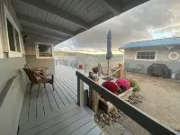 Water front, private beach, steps from down town Hoodsport with lots of parking.