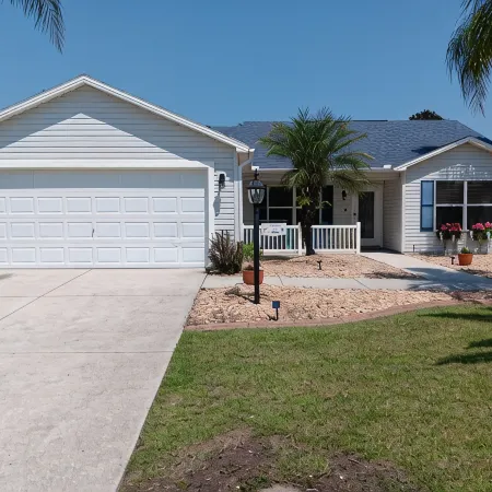 Paradise Village home in perfect golfing and recreation center location.