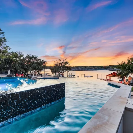 Lake Front Home with Pool, Dock, Views, Sports Court, & Beautiful Sunsets!