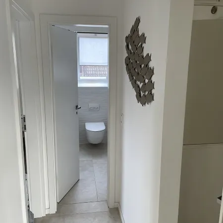 Bright, modern apartment with sauna at the house, between the districts of Dorf and Bad