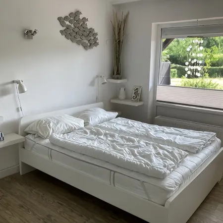 Spacious beach apartment in a quiet location with pool and sauna