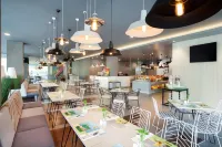 Hotel Neo Palma Palangkaraya by Aston - breakfast