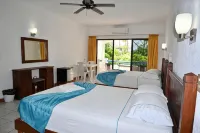 Pelicano Inn Playa del Carmen - Beachfront Hotel