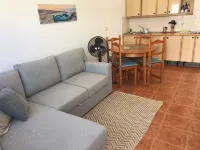 Cozy beachfront apartment with wonderful sunsets