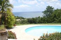 between the sea and the Caribbean sun garden - 2 étoiles