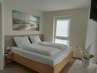 NEW! modern, high-quality, central apartment, with sauna, garden, wallbox in Burhave