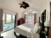 Villa Flamingo; Sleeps 8; Waterfall, Oceanfront Pool, Hot Tub