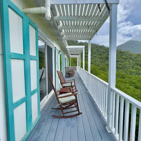 Quiet hillside villa with expansive sea, beach, and mountain views...