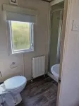3 beds dog friendlyThe Lodge at Hafan Church Bay, Gadlys Coastal Cottages Group