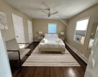 Stylish yet cozy experience at this centrally-located place in Patchogue. - Apartments