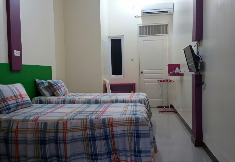 Urbanpoint Hotel Syariah Pringsewu Lampung 객실