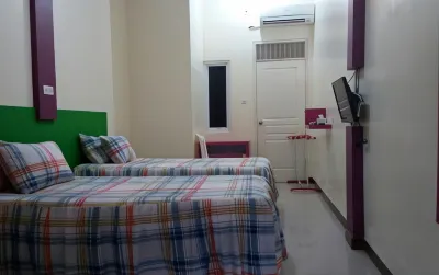 Urbanpoint Hotel Syariah Pringsewu Lampung Hotels near Damar papan, reki yesma