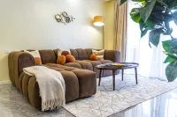 Chic Loft steps from Yaya Center | Pool + gym