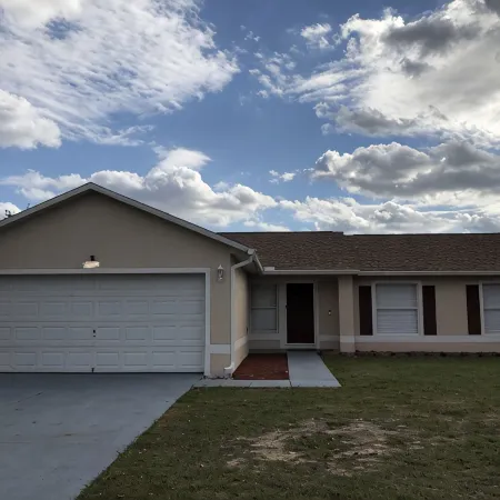 Cozy 4 bedroom 2 bathroom Pool Home with game room Close to all the parks.