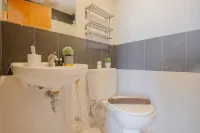 2BR Apartment Connected to Mall at Cinere Bellevue Suites By Travelio