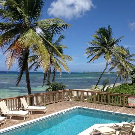 The Pink Beach House - Private House and Pool directly on the Beach, Rum Point