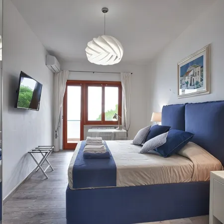 A terrace overlooking the gulf. Stylishly furnished apartment for relaxing days.