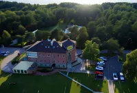 Roze Village Jūrnieka Ligzda Hotels in Pērkone